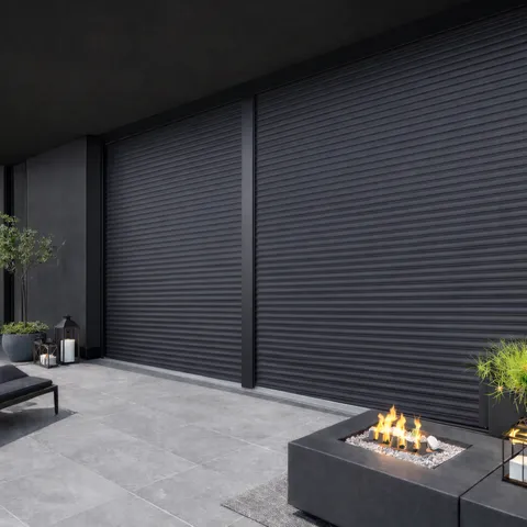 Aluminium roller shutters on a modern home