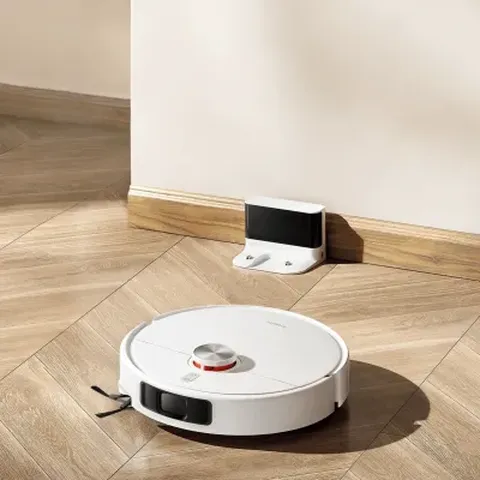 Robot vacuum cleaning a modern home