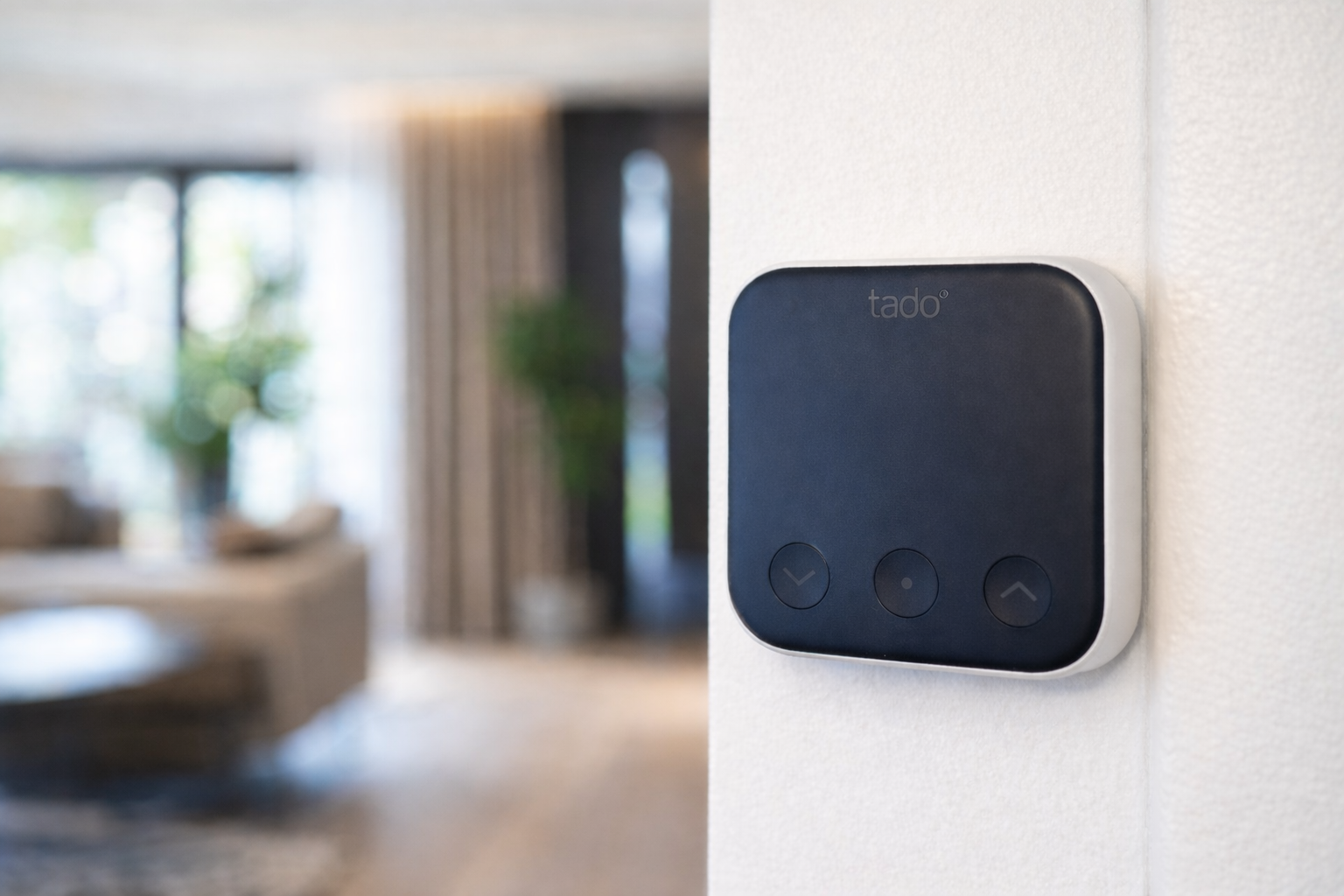 Smart thermostat mounted on a wall