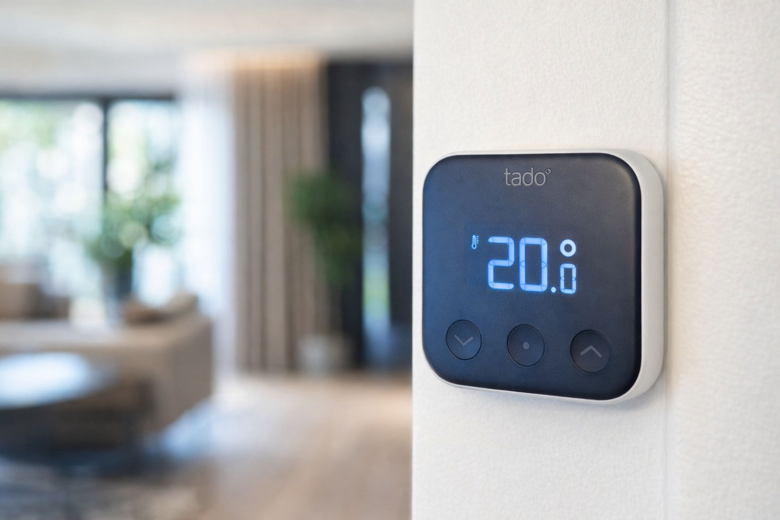 Smart thermostat mounted on a wall